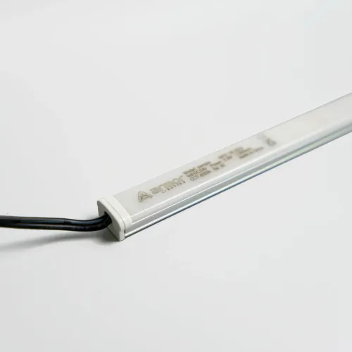 Retail shelf lighting integrated into a fixture